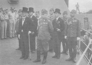 Japanese delegates waiting to sign surrender document onboard the battleship USS Missouri