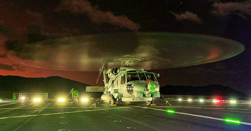 Seahawk helicopter on the flight deck of HMAS Choules