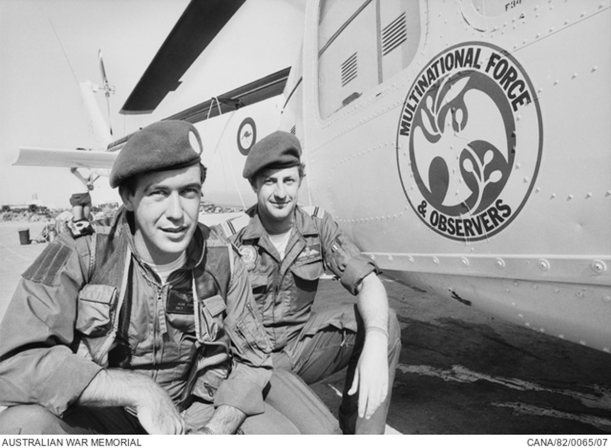 Sub-Lieutenant Alan Fisher and Flying Officer Murray Joel prior to boarding their helicopter for a patrol.