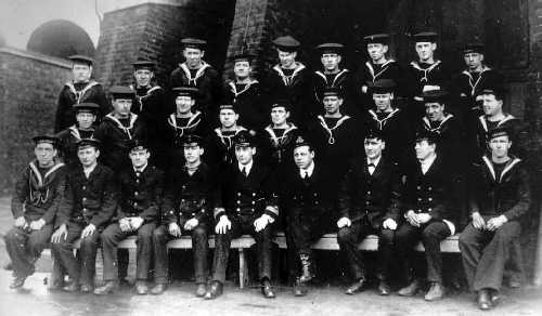 The complete crew of HMAS AE2, taken in the UK in 1914.   Mitchell is second from the right in the top row