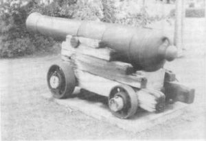A muzzle loading cannon, manufactured in 1803, and sent to Cooktown in 1883 "…with three cannon balls, one officer and two rifles", in response to the perceived Russian threat in the south-west Pacific in the late 1870s. Photographed beside the Endeavour River, in Central Cooktown, 1996.