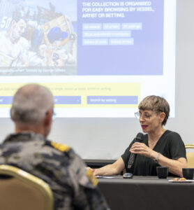 Ms Belinda Johnstone gives a website demonstration during the Naval Historical Launch held at the Castlereagh Boutique Hotel, Sydney.