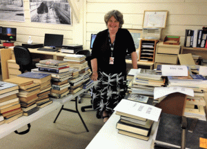 Elizabeth Colthorpe , Librarian Reviewing Book Donations August 2017 Elizabeth Colthorpe , Librarian Reviewing Book Donations August 2017