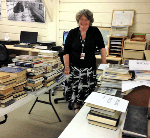 Elizabeth Colthorpe , Librarian Reviewing Book Donations August 2017