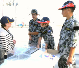 Fairlie Clifton with NRC sailors at Fleet Base East Open Day