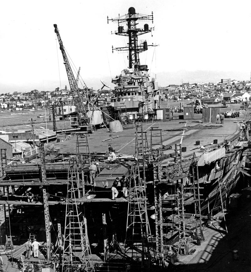 HMAS Melbourne under repair in the Sutherland Dock in 1969 after her collision with the destroyer USS Frank E Evans