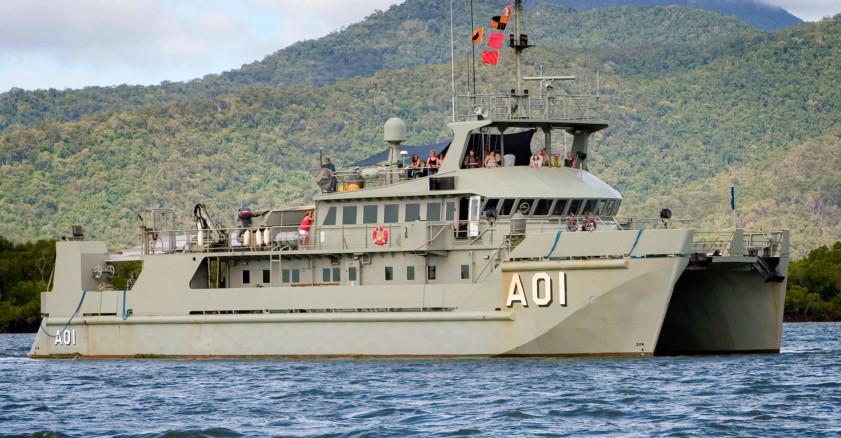 HMAS Paluma returns to HMAS Cairns after a family day out on the water.