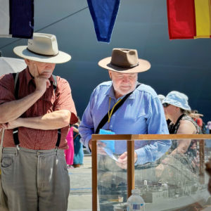 NHSA Volunteer Stephen Martin (left) with visitor at NHSA information stand..