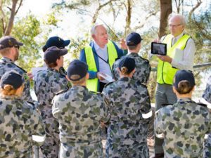 Mr Leyland Wilkinson and David Stockman guiding HMAS Kuttabul sailors at Garden Island 2016