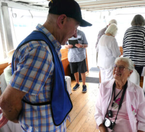 Noel Phelan chatting with passenger