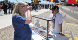 Fairlie Clifton chatting with a visitor.