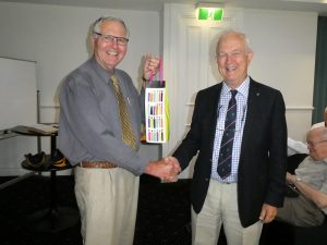 Quiz Champion John Ellis (R) receiving prize from President David Michael at AGM 21 Nov 2019