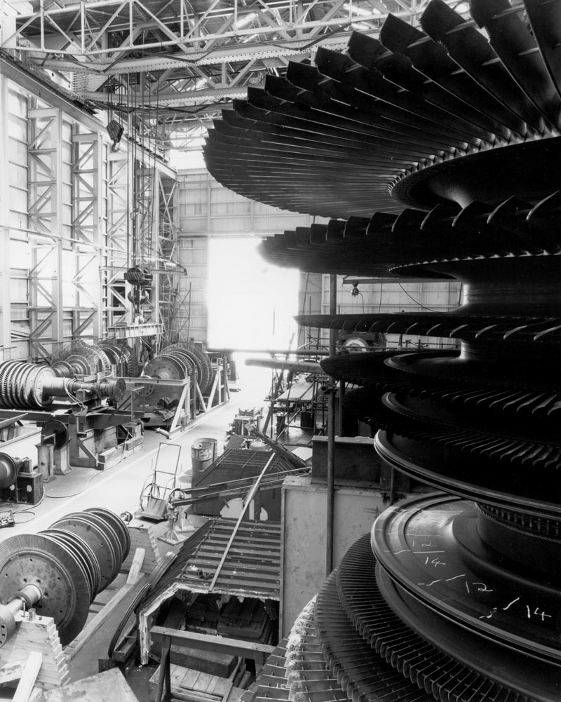 A wide range of turbine rotors under repair in the Turbine Shop on Cockatoo Island in the 1980s